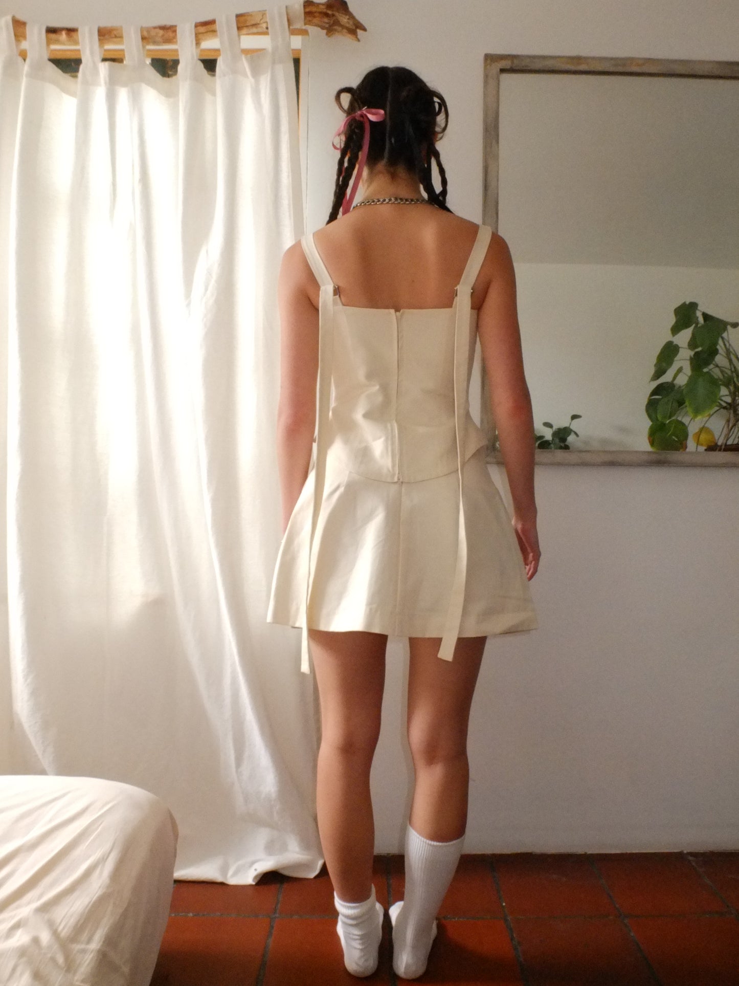 Short Mini Cream Canvas Skirt with Pockets and Lace-Up Details - back view